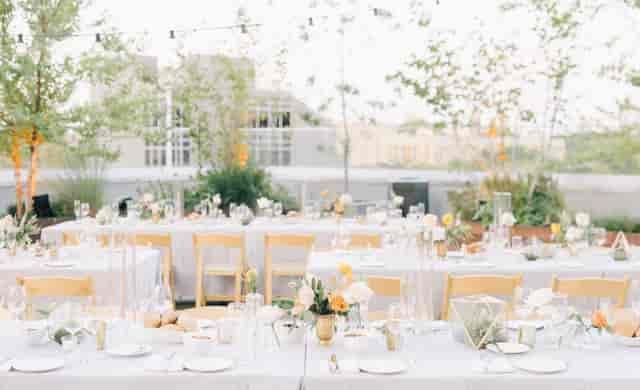 Vale Ballroom at The William Vale, outdoor event space with elegant table settings for receptions.