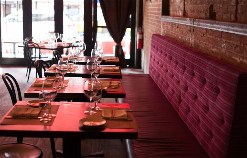 Stylish brunch restaurant in Il Bastardo with plush seating for intimate events.