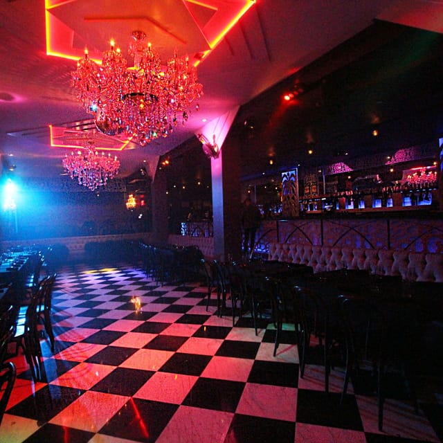 Upscale brunch venue with black and white checkered floor, ideal for events and receptions.