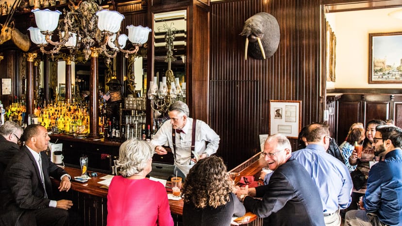Lively bar at The Grill DC with vintage decor, perfect for networking events and receptions.