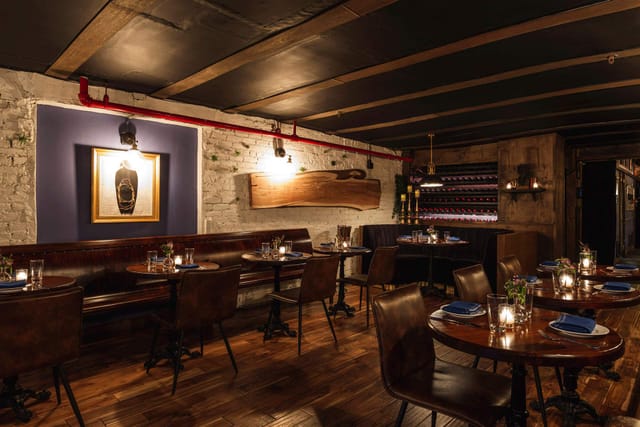 Cozy upscale restaurant interior in Alice NYC, ideal for intimate or corporate events.