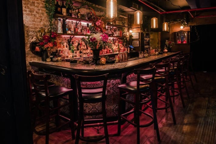 Elegant bar in Alice NYC, perfect for intimate gatherings and themed events.