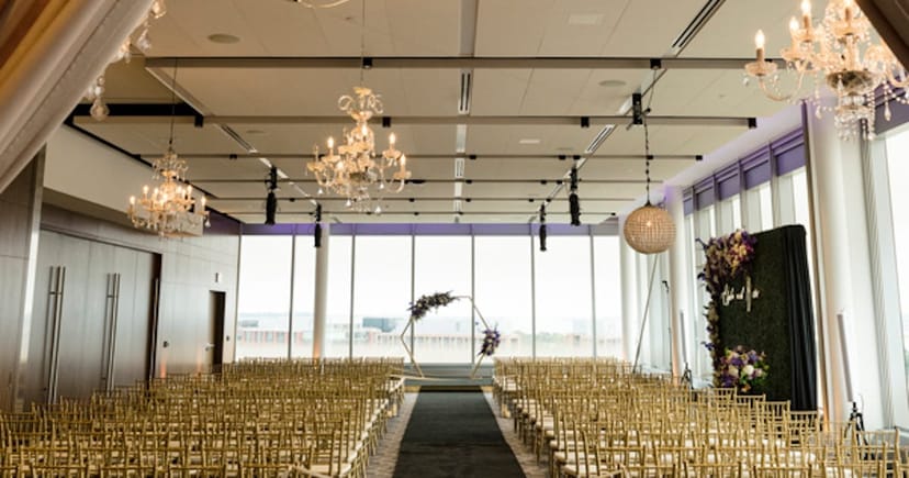 Elegant Ballroom at International Spy Museum with gold chiavari chairs for weddings.