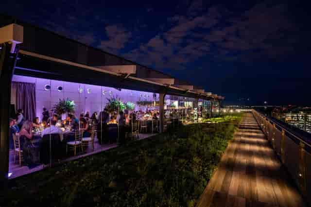 Elegant rooftop terrace with skyline views, perfect for gala or networking events.