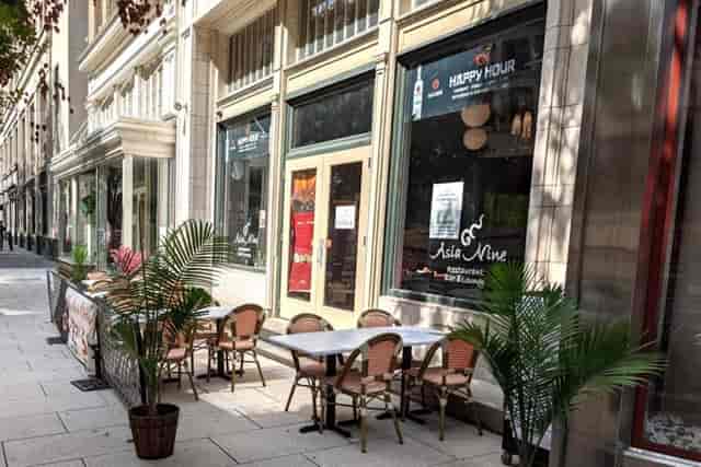 Outdoor seating at Asia Nine DC restaurant, ideal for casual meetings and social events.