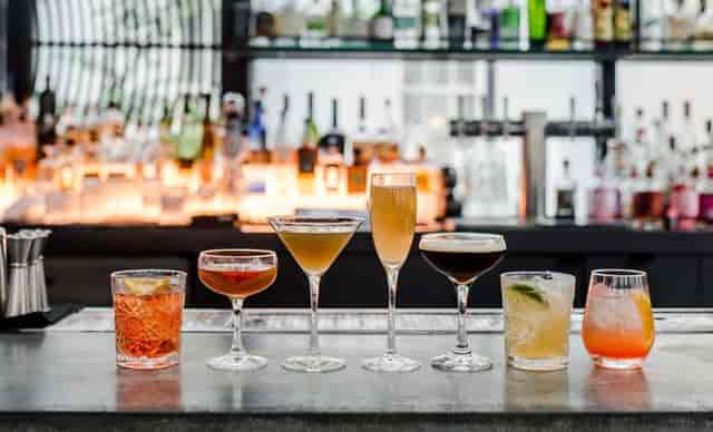 Stylish cocktail bar setup at Dirty Habit, ideal for networking events and celebrations.