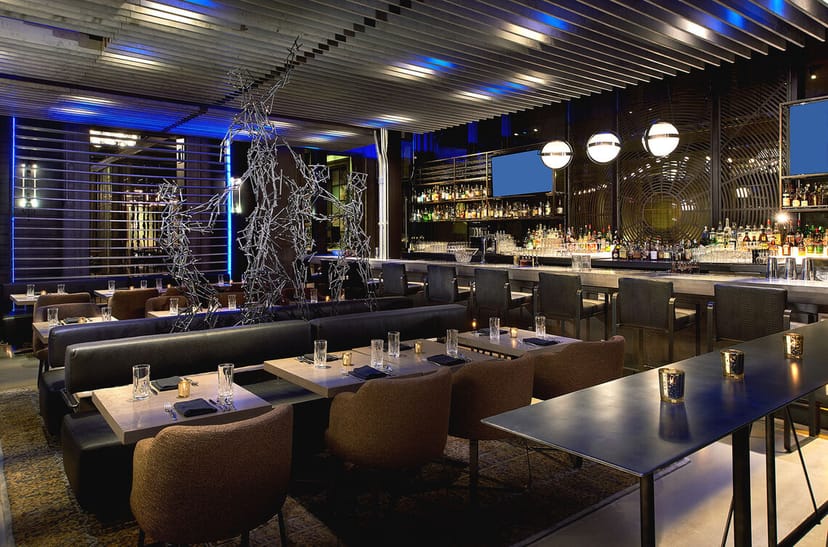 Sleek modern restaurant with plush seating for private events and upscale gatherings.