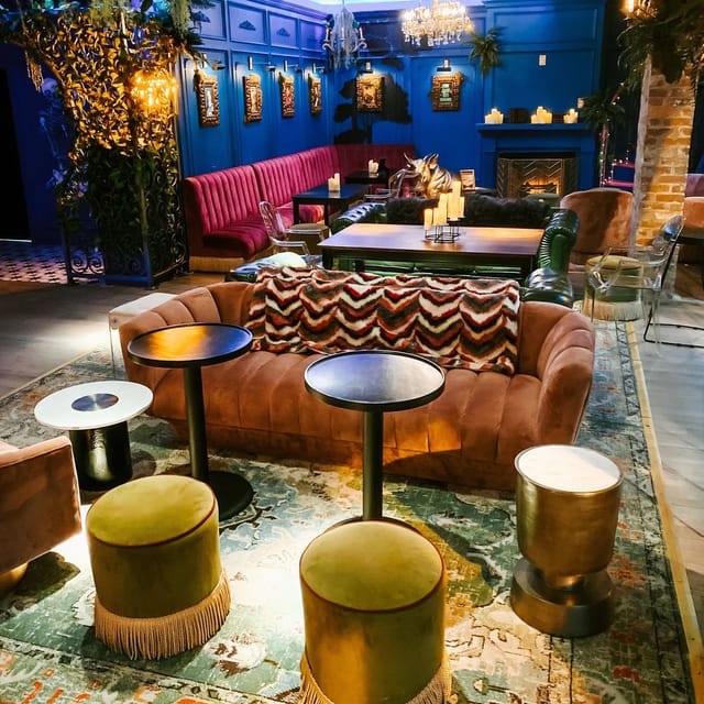 Stylish lounge at Harlot DC for networking and events with plush seating and intimate lighting.