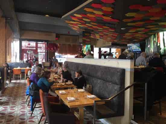 Vibrant Jaleo restaurant patio, ideal for networking events and informal meetings.