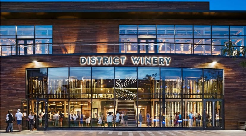 Modern District Winery Tasting Bar with glass windows, ideal for corporate events and receptions.