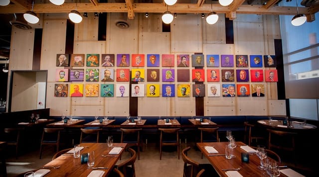 Modern Tasting Bar at District Winery with vibrant art, ideal for events and gatherings.