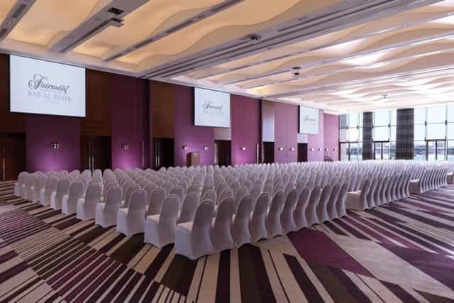 Saqr Ballroom at Fairmont Bab Al Bahr, elegant conference setup with modern design.