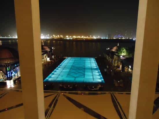 "Al Hanah Bar poolside venue, upscale events in Abu Dhabi, elegant ambiance"