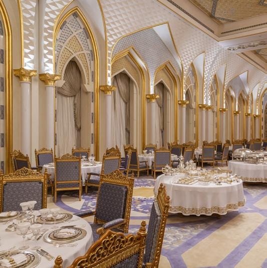 Luxurious ballroom with intricate arches for elegant weddings and corporate events.