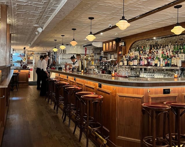 Stylish Taft Bar in Manhattan Manor, ideal venue for networking events and gatherings.