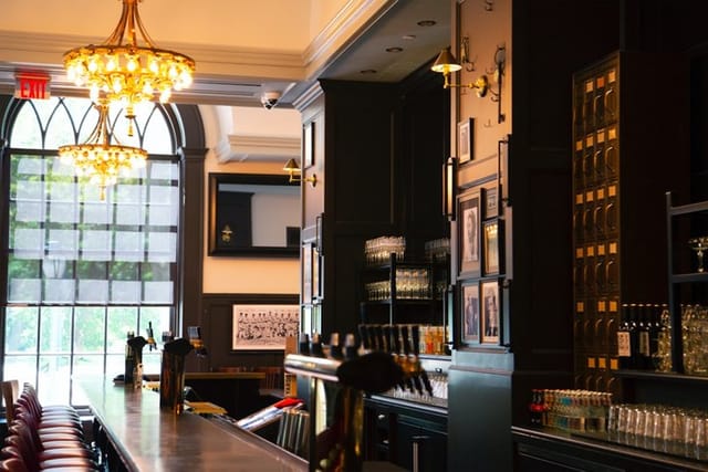 Stylish bar at P.J. Clarke's, perfect for cocktail receptions and networking events.