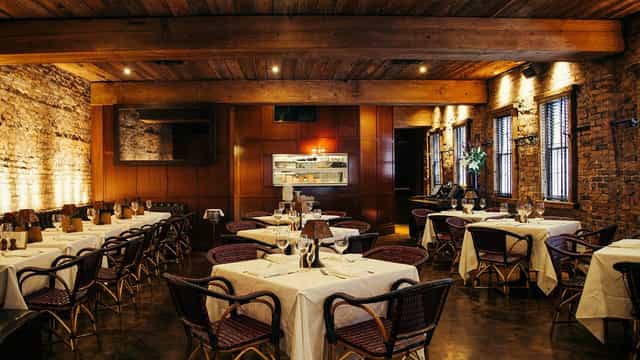 Cozy P.J. Clarke's Restaurant interior, ideal for networking dinners and small events.