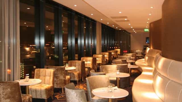 Elegant Zeus Lounge in Cloud23, perfect for cocktail receptions and intimate gatherings.