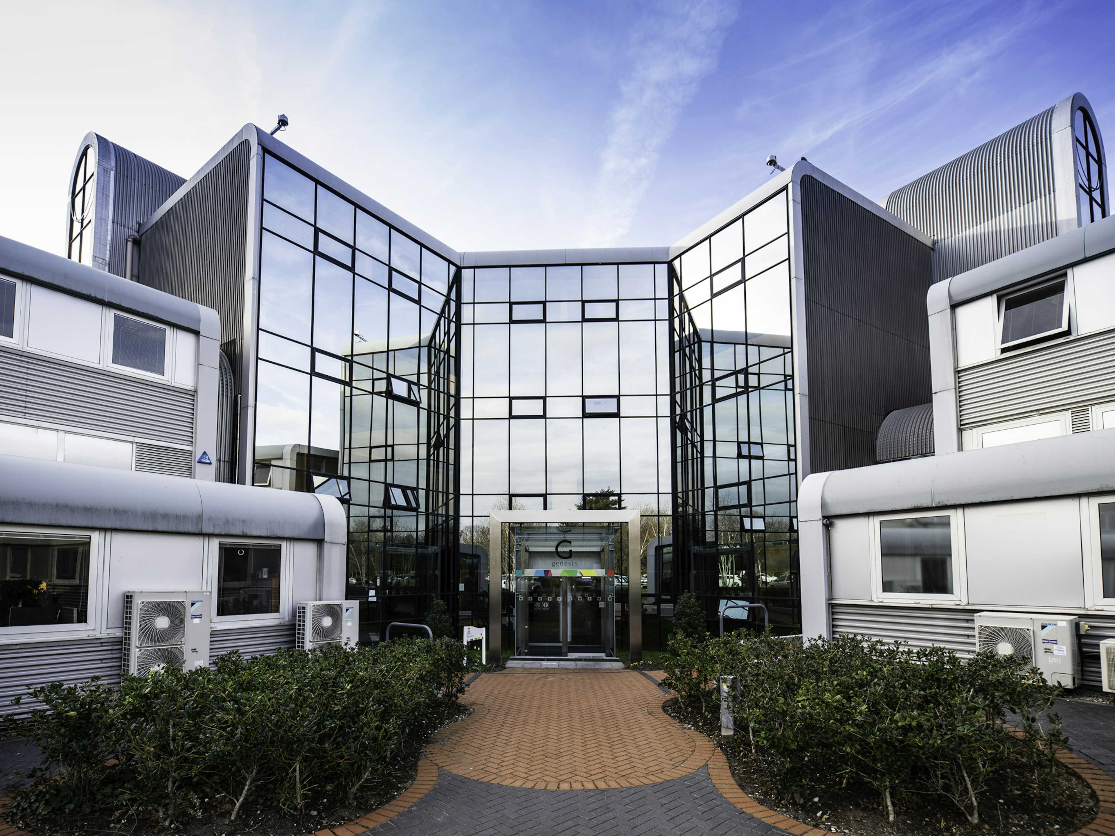 Modern conference room with glass facade at UBC Flexible Offices for corporate events. - Banner