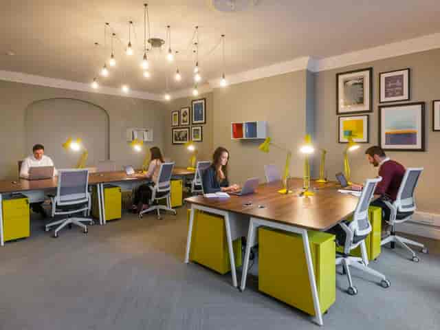 Modern meeting room at UBC Flexible Offices with ergonomic seating for collaborative events.