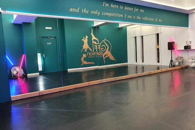 Versatile dance studio with large mirror, perfect for events and workshops at 0161 Studios.