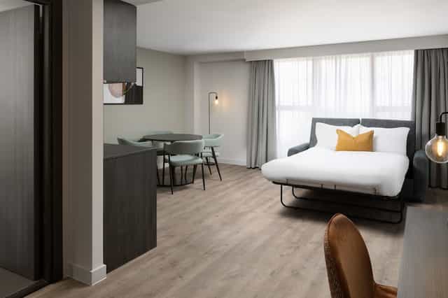 Modern meeting suite with cozy seating at Residence Inn Manchester Piccadilly, ideal for events.