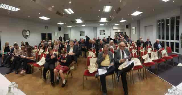 Engaged attendees in professional meeting setup at Stanley House Function Rooms.