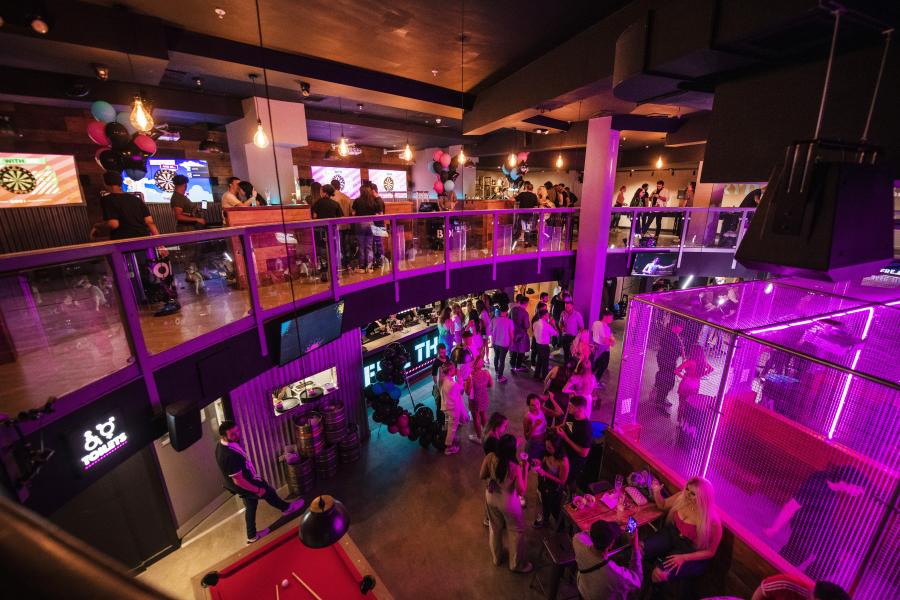 Vibrant event space with colorful decor for corporate functions and celebrations at 532 Bar + Kitchen. - Banner