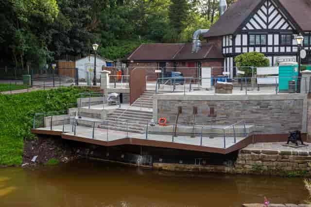 Waterfront restaurant terrace with scenic views for outdoor events and gatherings.