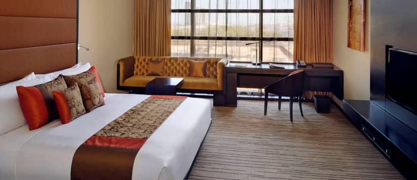 "Meeting Room 2 at Southern Sun Abu Dhabi, featuring a sleek workspace for executive retreats."