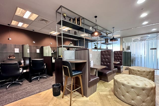 Modern co-working space with stylish decor for meetings and collaboration.