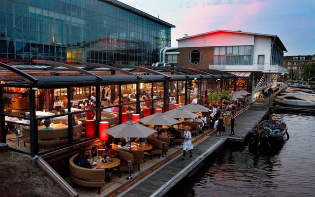 Outdoor terrace at The Harbour Club Amsterdam Zuid, perfect for summer events and gatherings.