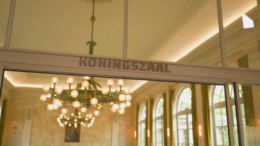 Elegant Royal Hall meeting space with chandelier, ideal for corporate events and gatherings.