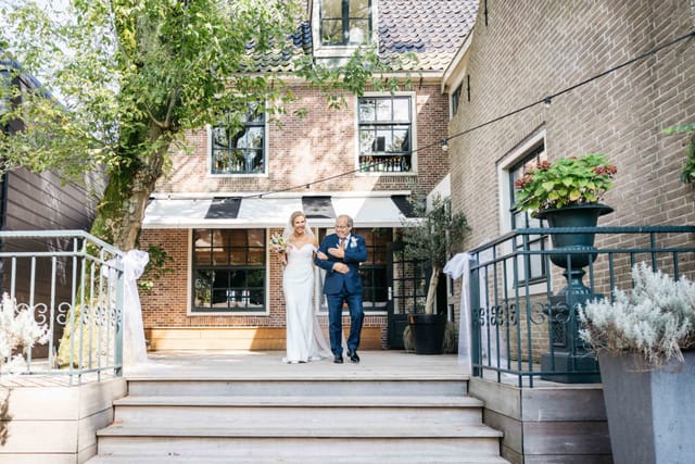 Elegant outdoor wedding venue with lush greenery at Brasserie Paardenburg.