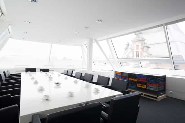 Modern meeting room in Stedelijk Museum, ideal for workshops and discussions.