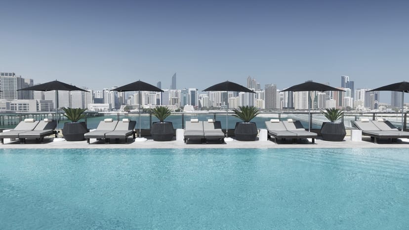 Rooftop pool at Four Seasons Hotel Abu Dhabi for upscale events and networking.