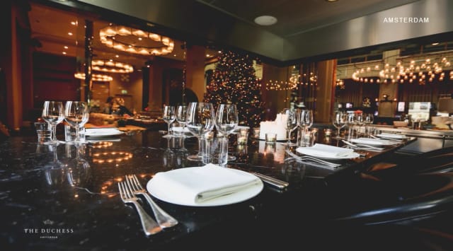 Elegant private dining setup with seasonal decor, perfect for corporate events or gatherings.