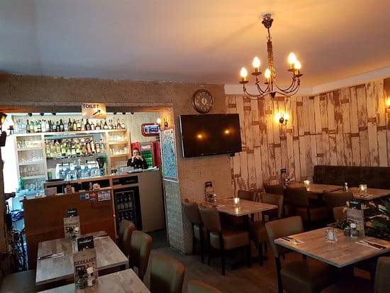 Cozy restaurant Peppino Amsterdam, perfect for intimate gatherings and networking events.