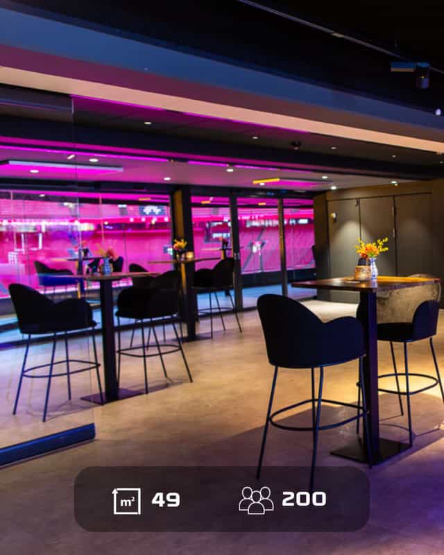 Modern event space in Johan Cruijff ArenA with sleek chairs, perfect for networking and gatherings.