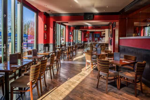 Modern dining space at Hard Rock Cafe Amsterdam, perfect for networking events and meetings.