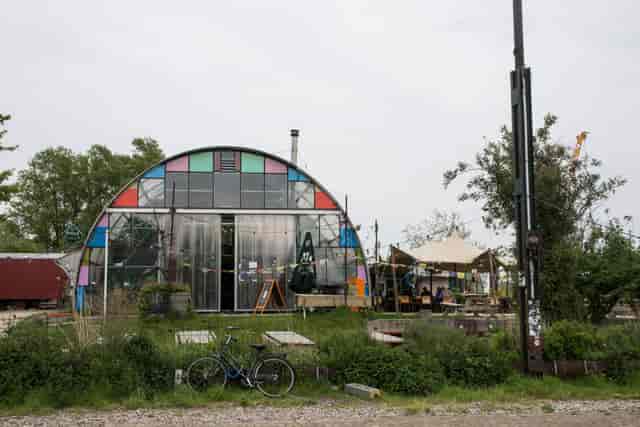 Café Noorderlicht with arched design and colorful glass, perfect for creative events.