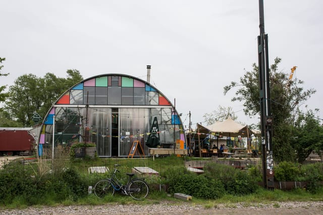 Café Noorderlicht with arched design and colorful glass, perfect for creative events.