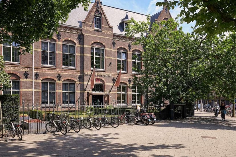 The Courtyard at College Hotel Amsterdam, classic brick venue for events and meetings.