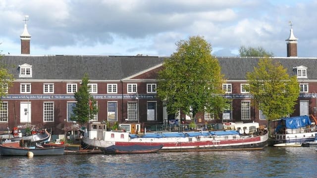 Charming H'ART Museum courtyard by the water, ideal for corporate retreats and social events.