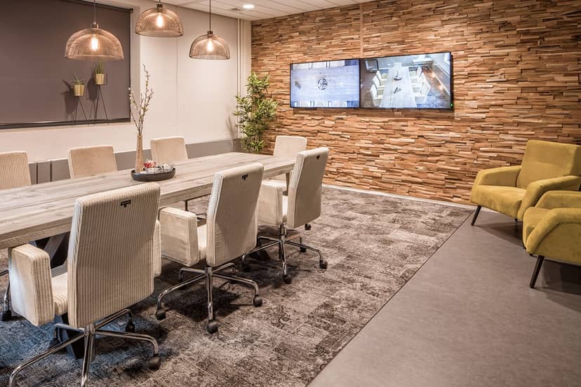 Modern conference room with elegant table, ideal for corporate meetings and focus groups.