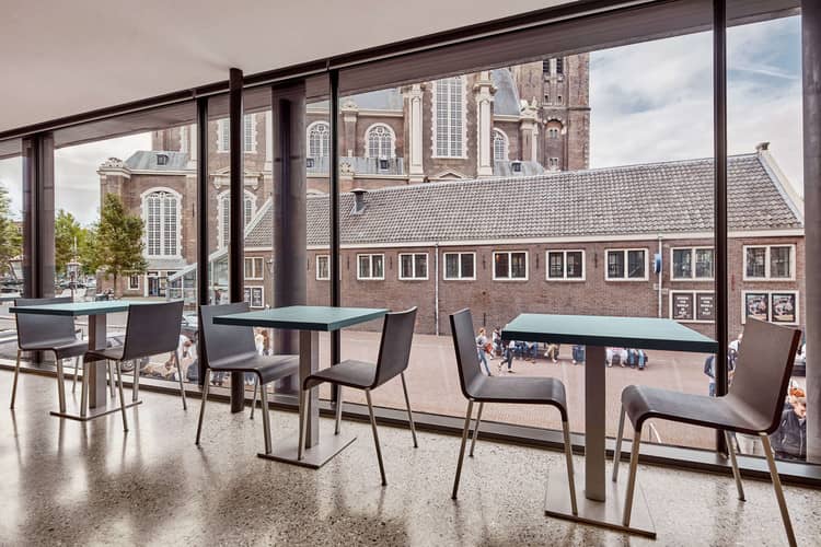 Museum café in Anne Frank House with modern seating, ideal for networking events.