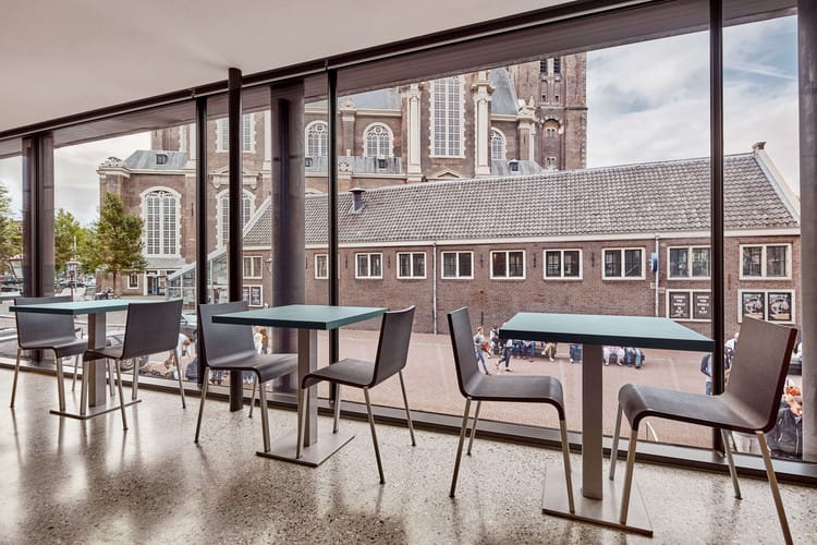 Museum café in Anne Frank House with modern seating, ideal for networking events.