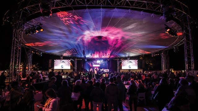 Illuminated tent at Efteling's Speelweide for events, concerts, and festivals.