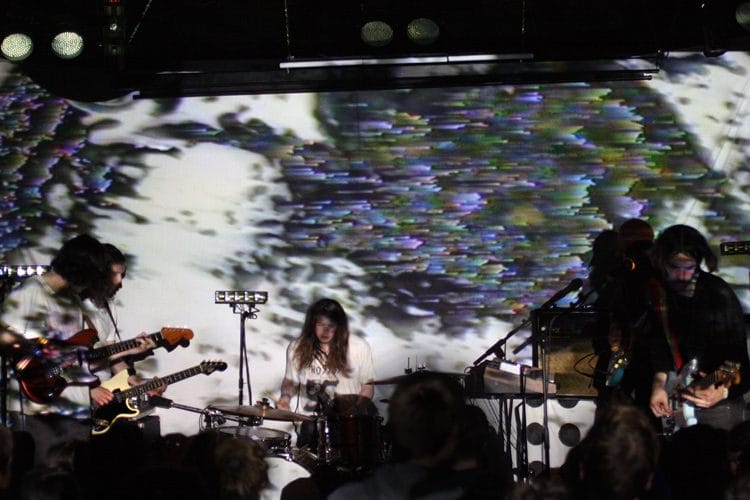Zaal live music performance with vibrant visuals and engaging atmosphere.