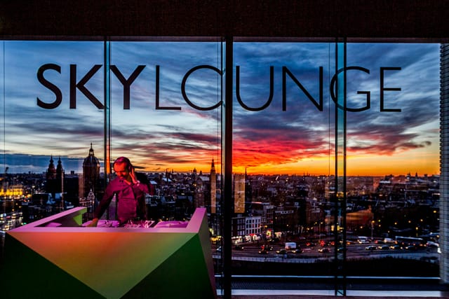 Sky Room rooftop venue in Amsterdam with sunset views, perfect for events and networking.